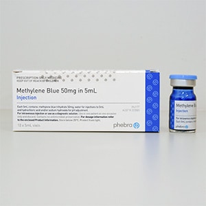 Medication box with the name Methylene Blue. A vial next to the box.