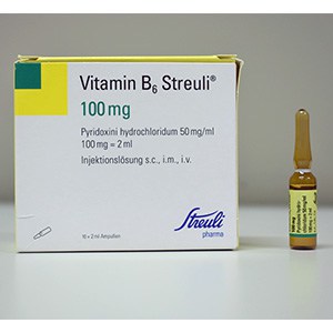 Medication box with the name Vitamin B6 Streuli. A vial next to the box.