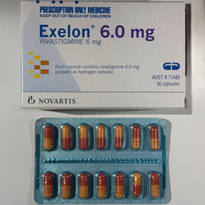 Medication box with the name Exelon Rivastigmine. A blister pack of pills below the box.